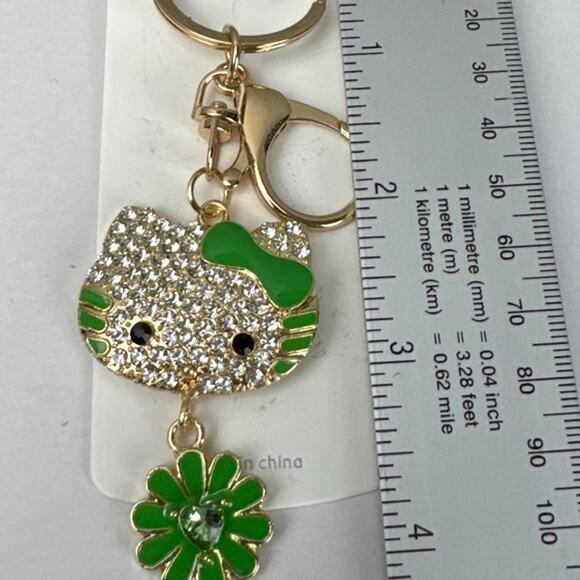 Hello Kitty Rhinestone Bag Charm Key Chain White Rhinestones with Green Accents - Picture 3 of 3